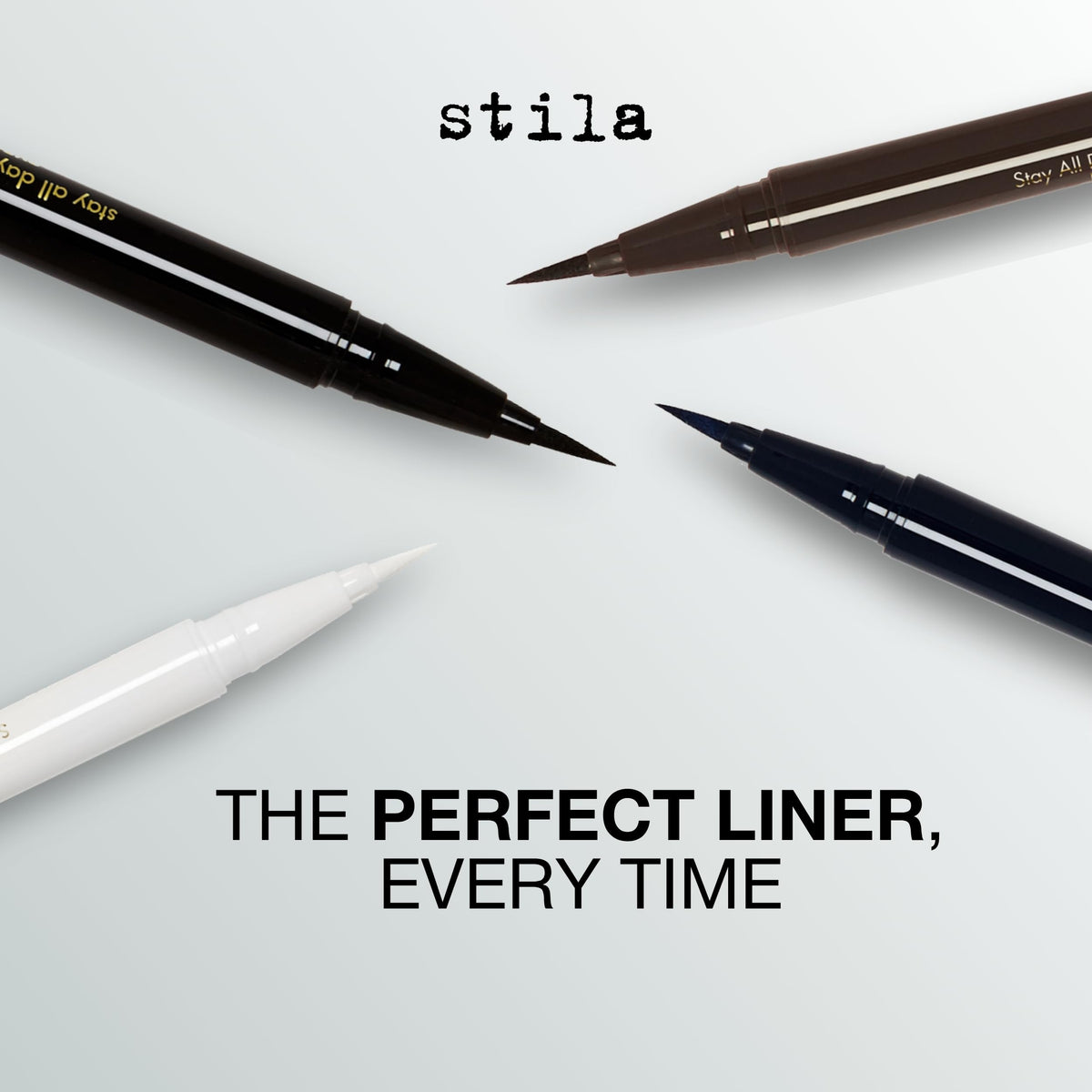 stila pen beside fingers showing compact 0.016 oz size for travel convenience