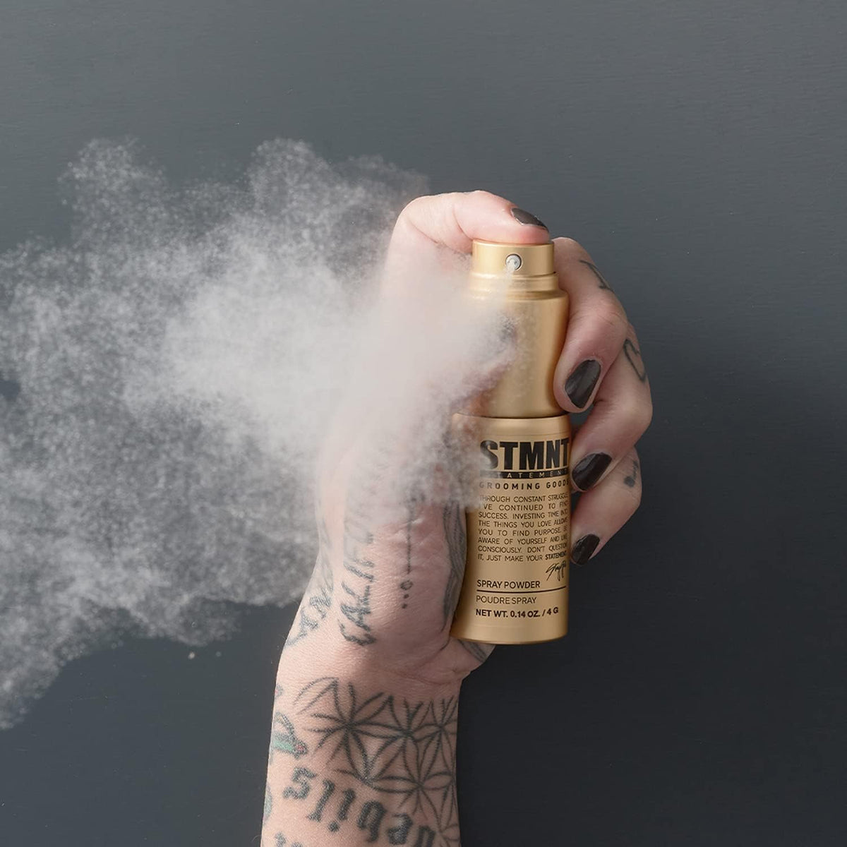 STMNT close-up of powder spray texture on hair providing instant grip