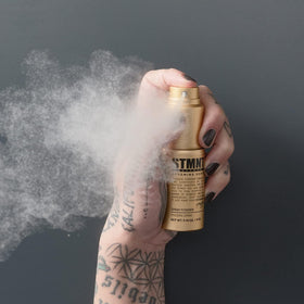 STMNT close-up of powder spray texture on hair providing instant grip