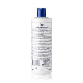 Close-up of Straight Arrow shampoo lather texture highlighting protein-rich formula