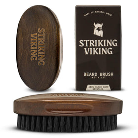Striking Viking front view of brown beech wood beard brush showing compact design and portability