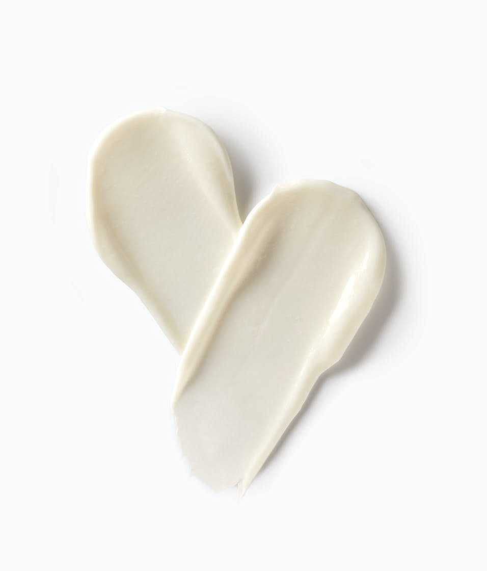 StriVectin swatch before and after on skin showing brighter, smoother look
