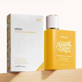 Sttes wearing perfume outdoors in sunlight evoking cheerful vibe benefit: sunny everyday fragrance