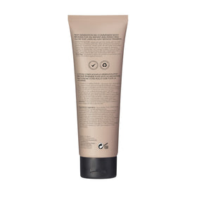 St.Tropez bronzer being applied with mitt, demonstrating seamless streak-free finish