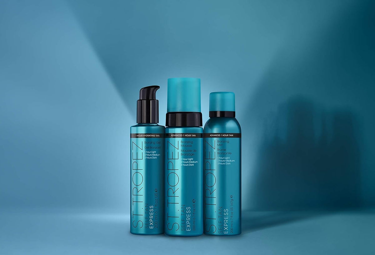 St.Tropez lifestyle image of applying bronzing mist to legs demonstrating quick, all-over tan