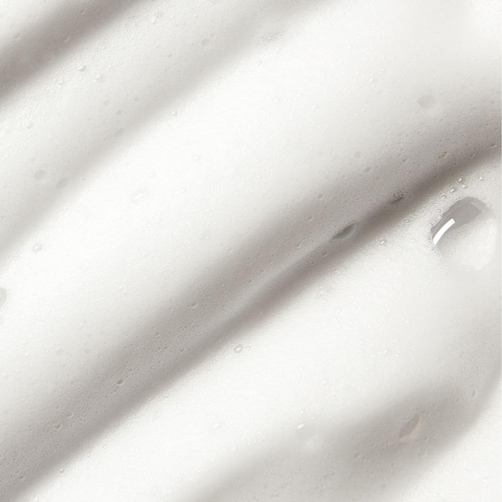 St.Tropez face mist spray in use delivering even bronzing and hydrating boost on skin