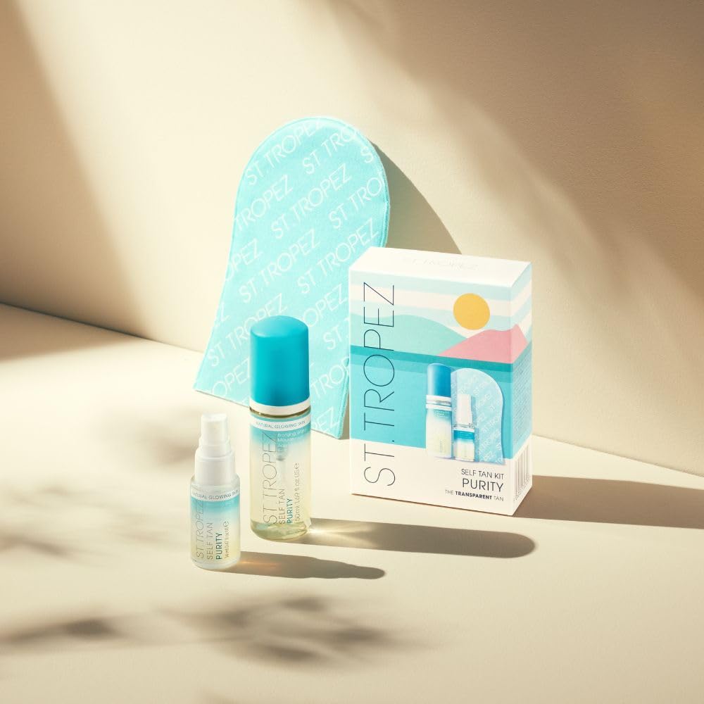 St.Tropez Purity travel size lifestyle shot highlighting compact kit for on-the-go glow