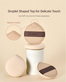 STUDIO17 puff blending foundation on hand to show even, streak-free finish