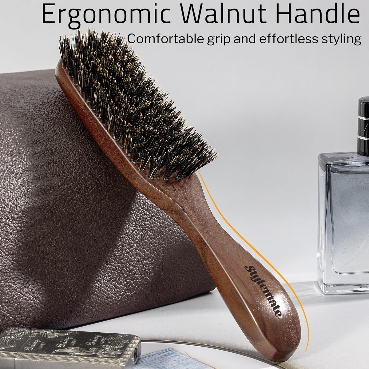 STYLEMATE brush in hand to show size and ergonomic walnut grip convenience