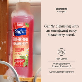 Suave bottle close-up label highlighting strawberry extract and vitamin E benefits