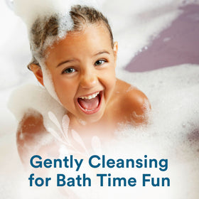 Child using Suave kids 3-in-1 in bathtub for faster, tear-free bath time