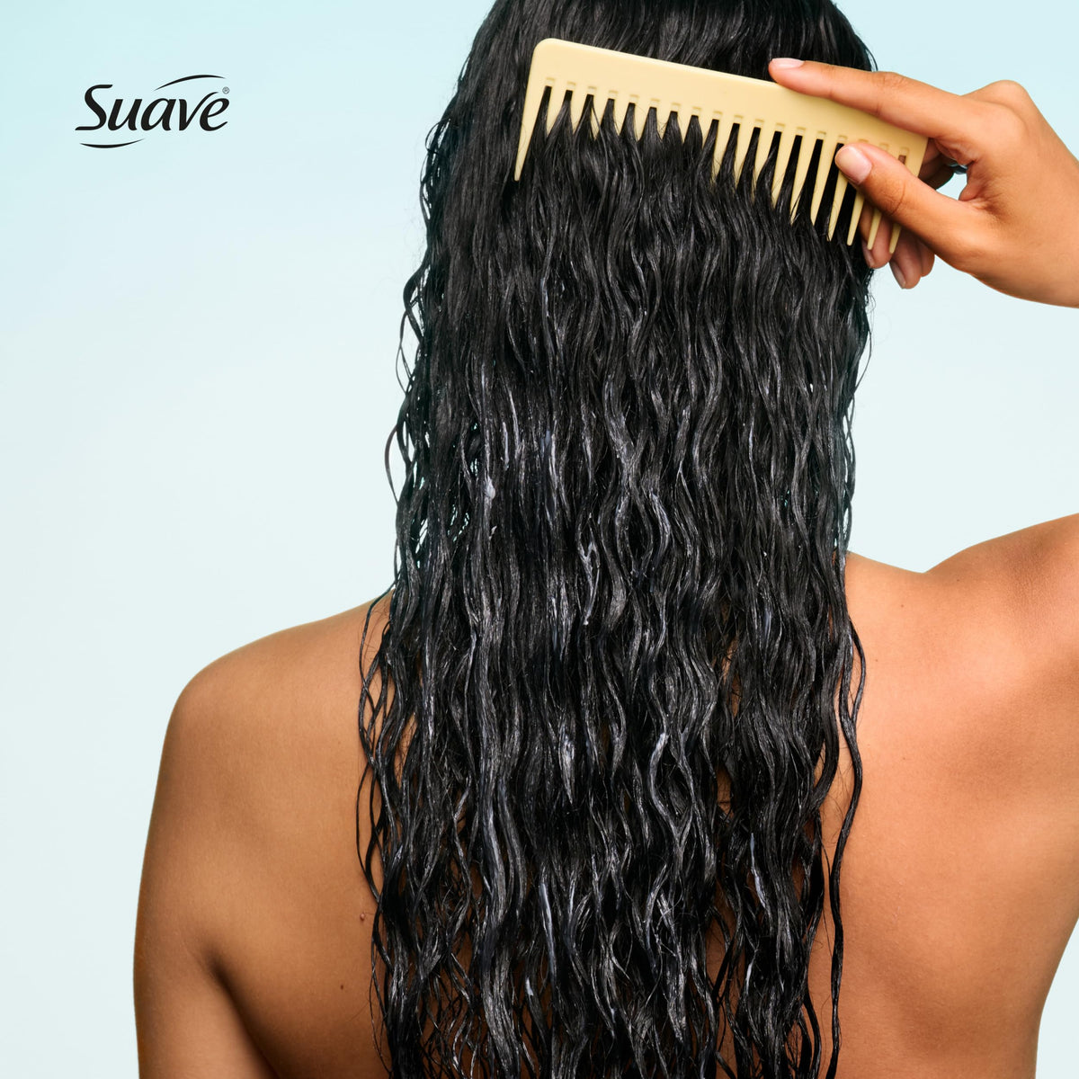 Suave conditioner applied in shower illustrating detangling and smoothing benefit