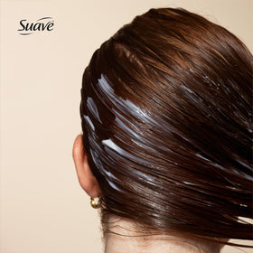 Person using Suave Ocean Breeze in shower illustrating refreshing daily routine