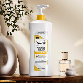 Suave applying lotion on forearm demonstrating smooth, non-greasy hydration