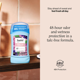 Suave antiperspirant stick with cap off ready to apply, promoting easy, mess-free use