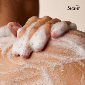 Suave strawberry delight creamy texture close-up showing rich lather and moisturizing feel