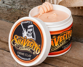 Model with styled hair using Suavecito showing added volume and defined texture