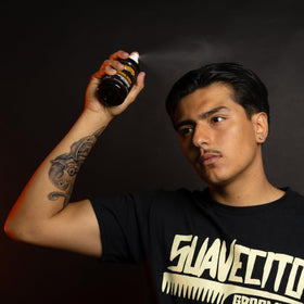 Suavecito used by barber on client showing long-lasting hold benefit