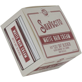 Jar next to coin and comb to show Suavecito product scale and travel convenience