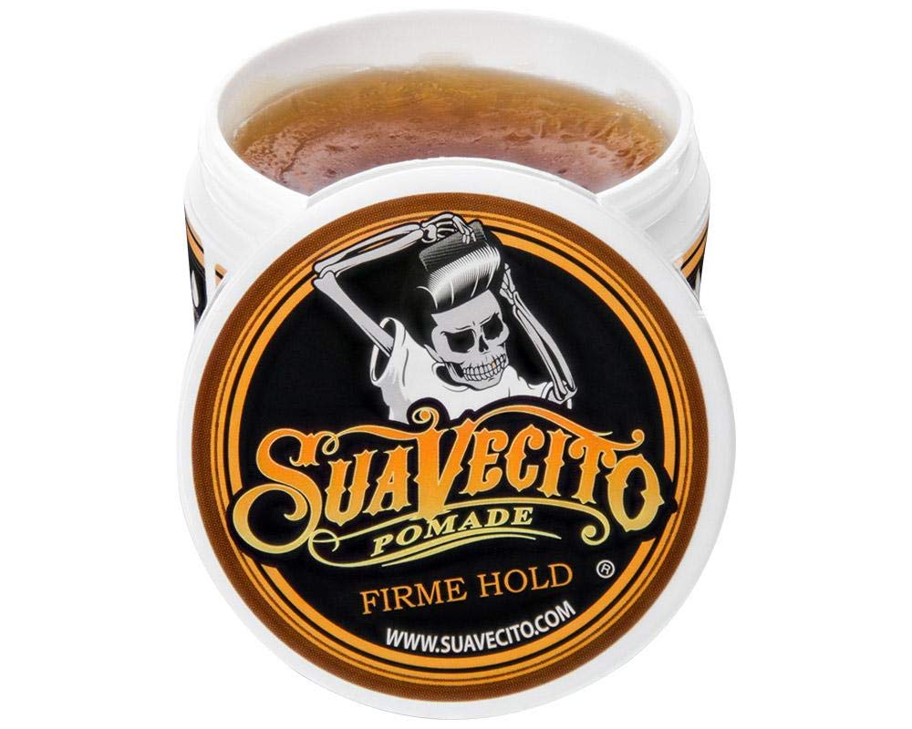 Suavecito pomade being combed through hair demonstrating strong hold benefit