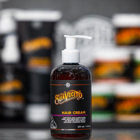 Suavecito styled long wavy hair showing reduced frizz and shine