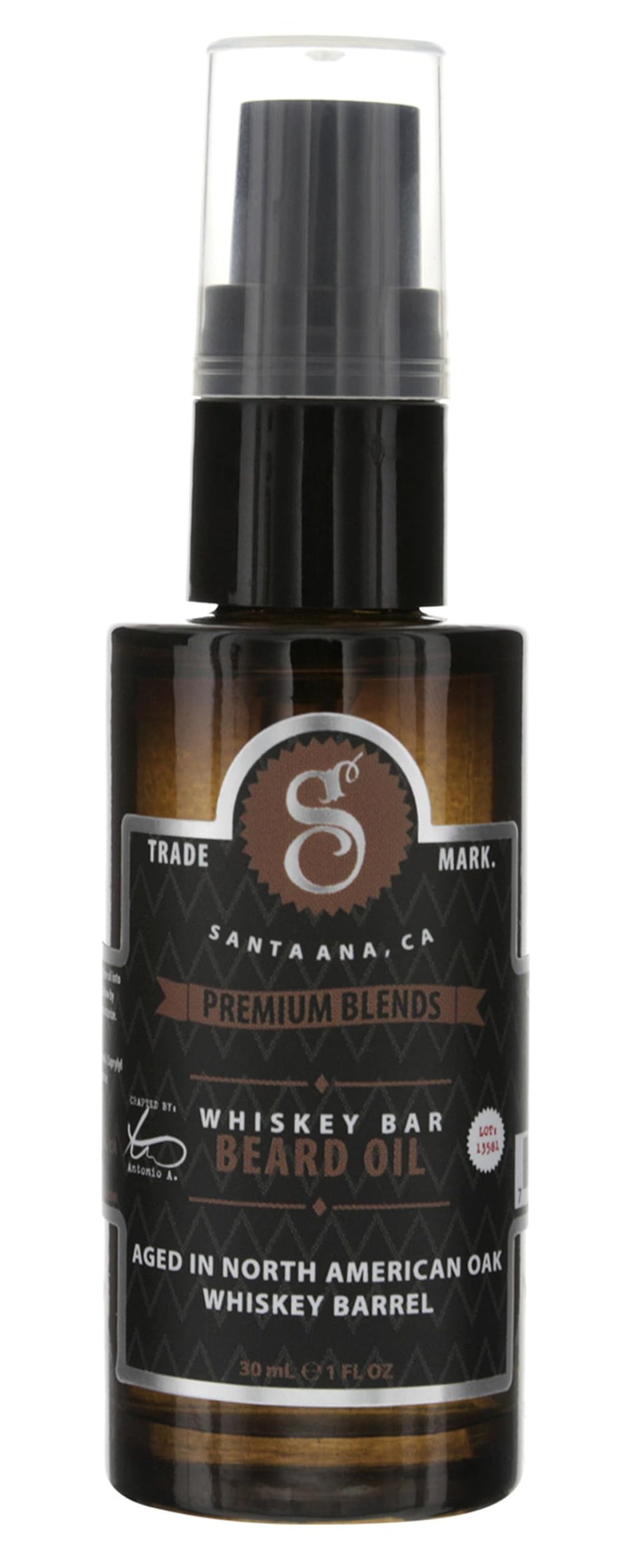 Suavecito bottle front packaging showing Whiskey Bar scent and benefit softens beard
