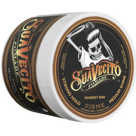 Suavecito Whiskey Bar 4 oz next to ruler showing compact size and travel-ready benefit