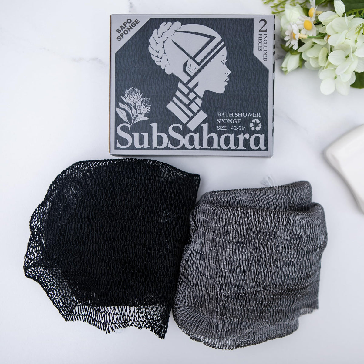 SubSahara sponge beside pouch showing compact size for easy travel benefit