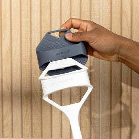 Sud Scrub side profile showing ergonomic curve for reduced wrist strain