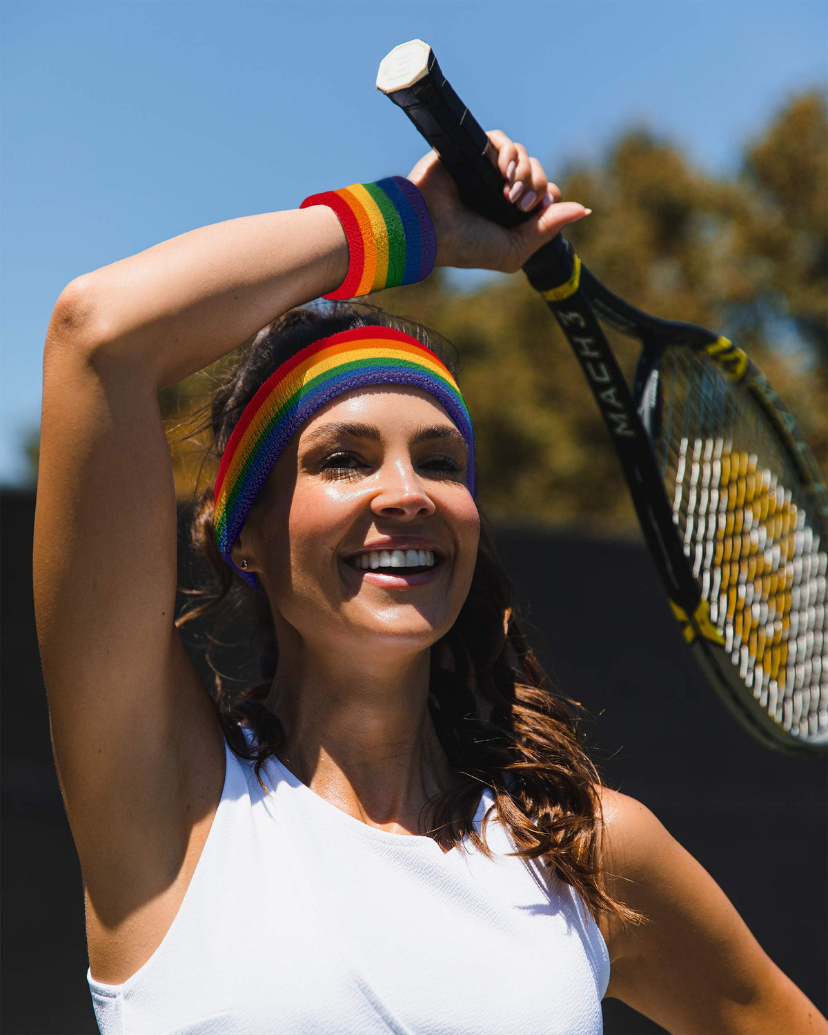 Suddora striped set worn by model at parade, colorful event-ready accessory