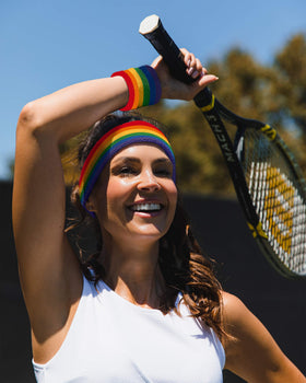 Suddora striped set worn by model at parade, colorful event-ready accessory