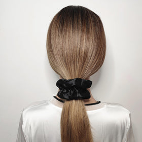 Sufermoe satin texture close-up showing smooth fabric and gentle hair protection