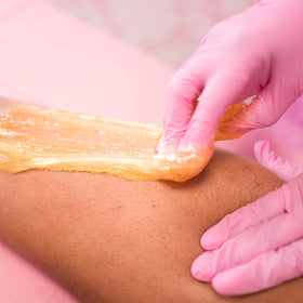 Sugaring NYC application on bikini line demonstrating precise hair removal benefit