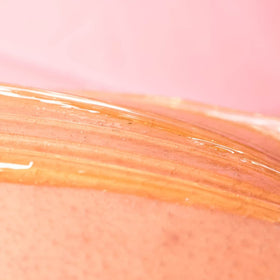 Precise application of Sugaring NYC paste on bikini area for controlled, gentle hair removal