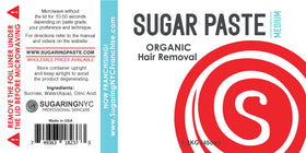 Close-up of Sugaring NYC paste texture showing smooth organic consistency