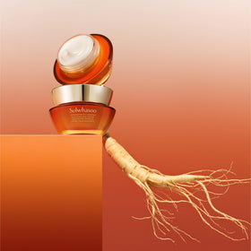 Sulwhasoo 0.33 fl oz jar next to coin showing compact travel-friendly size