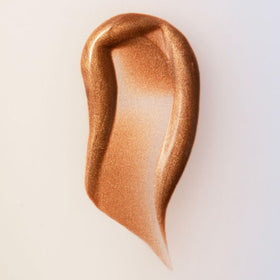 Summer Fridays dropper dispensing a bronze drop, demonstrates easy precise application benefit