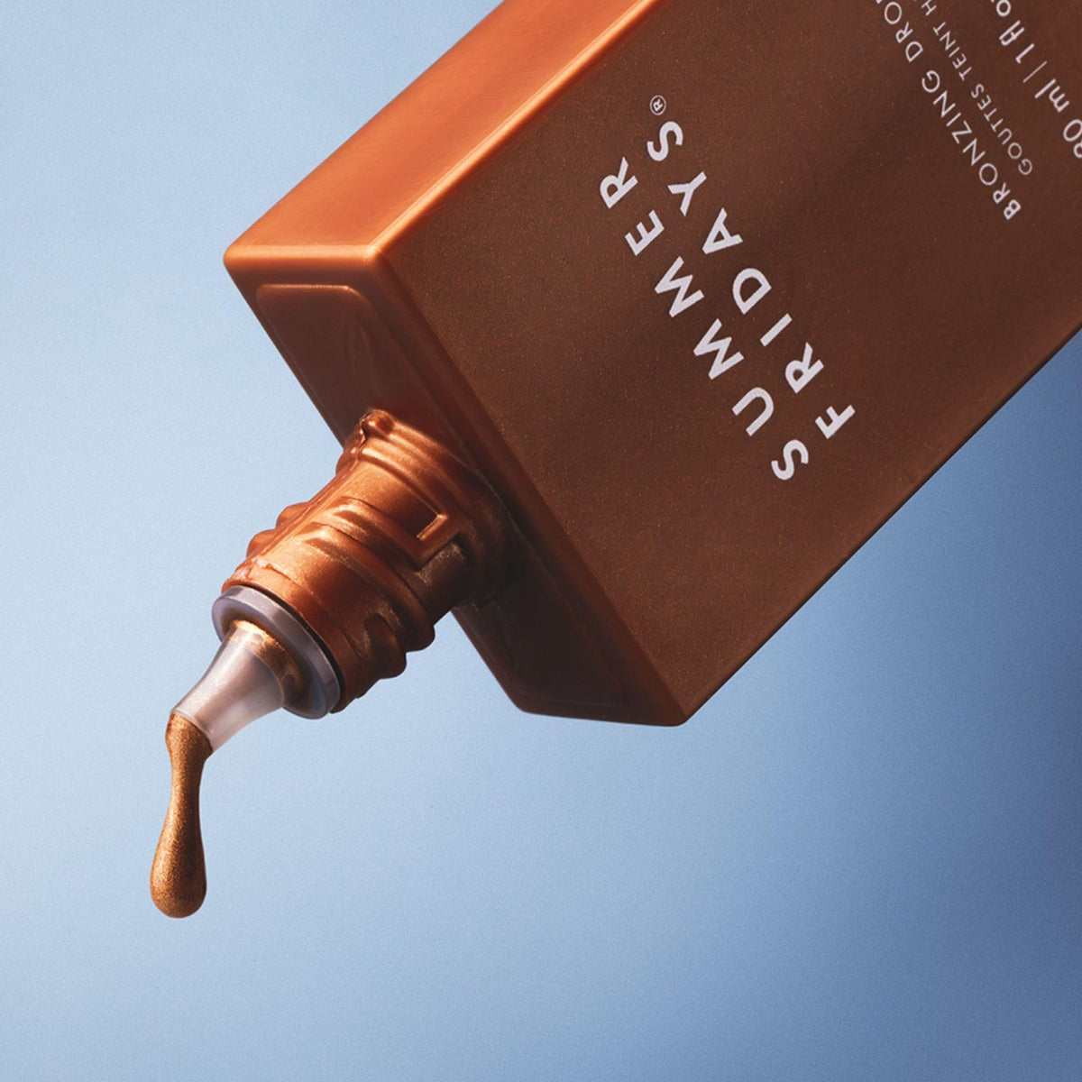 Summer Fridays close-up texture of liquid bronzer, shows dewy hydrating finish benefit