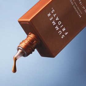 Summer Fridays close-up texture of liquid bronzer, shows dewy hydrating finish benefit