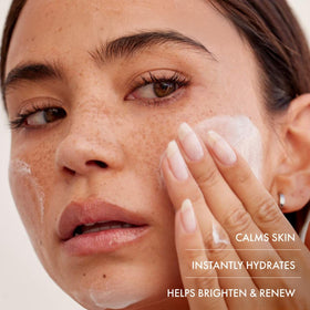 Summer Fridays open jar angled shot revealing glossy moisturizing mask inside
