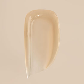 Summer Fridays balm with cap off showing twist applicator and easy use