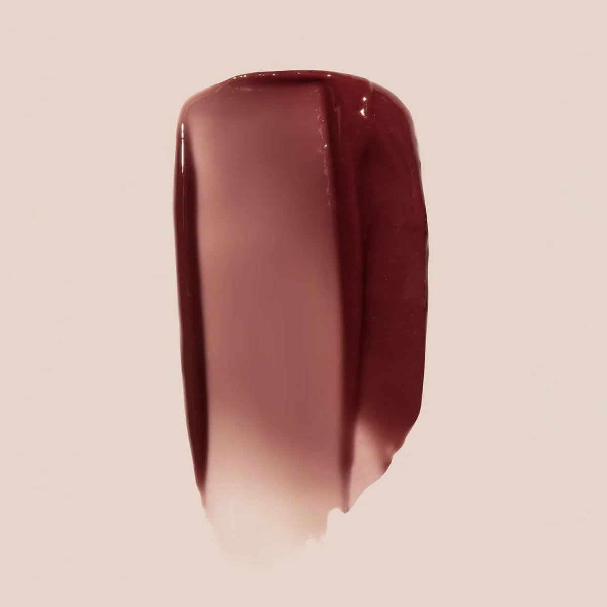 Summer Fridays open tube close-up showing smooth balm texture for easy glide