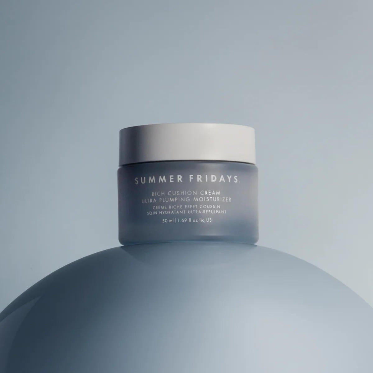 Summer Fridays jar on bathroom shelf scene conveying daily skincare ritual