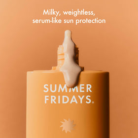 Summer Fridays dispensing milky sunscreen texture from pump for lightweight hydration