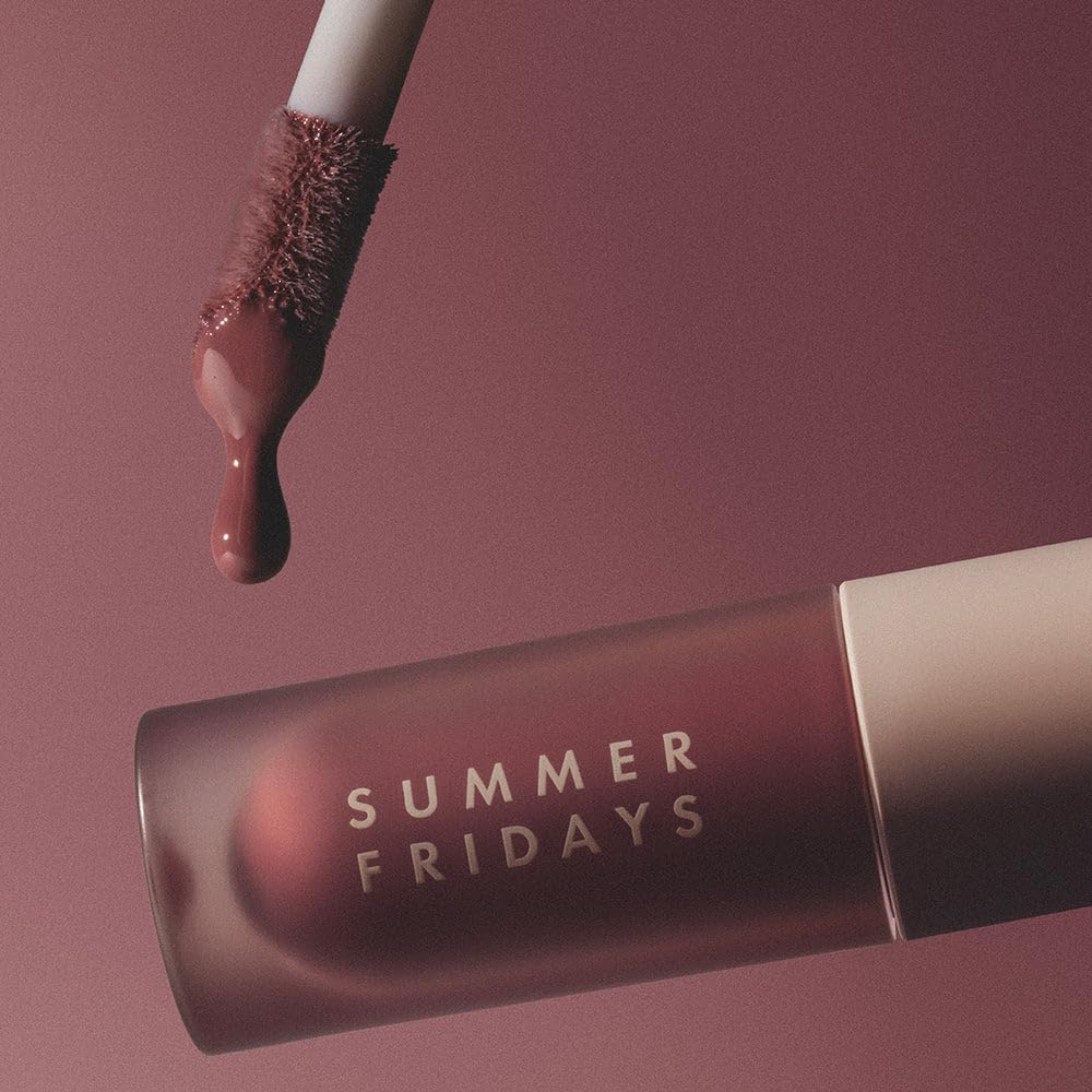 Summer Fridays layered over lipstick adding shine and dimensional color