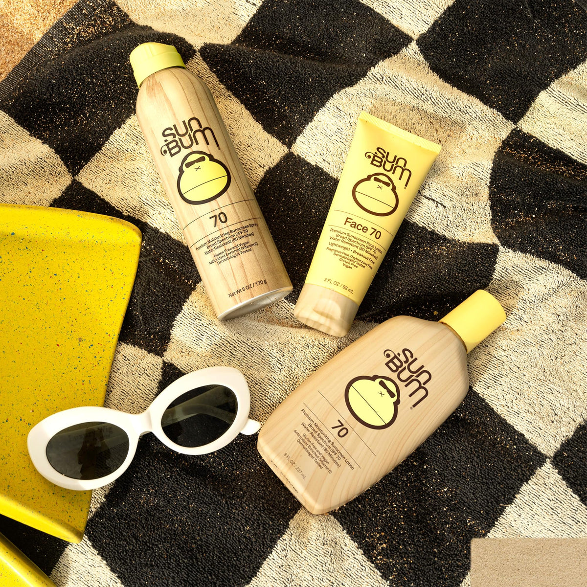 Sun Bum being applied to face highlighting broad-spectrum coverage benefit