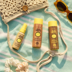 Sun Bum being sprayed on wet hair to detangle and reduce frizz quickly