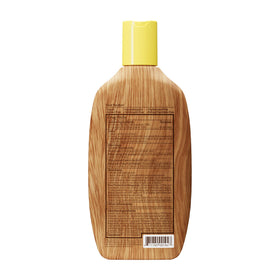 Sun Bum bottle on beach towel illustrating sun-ready protection during activities