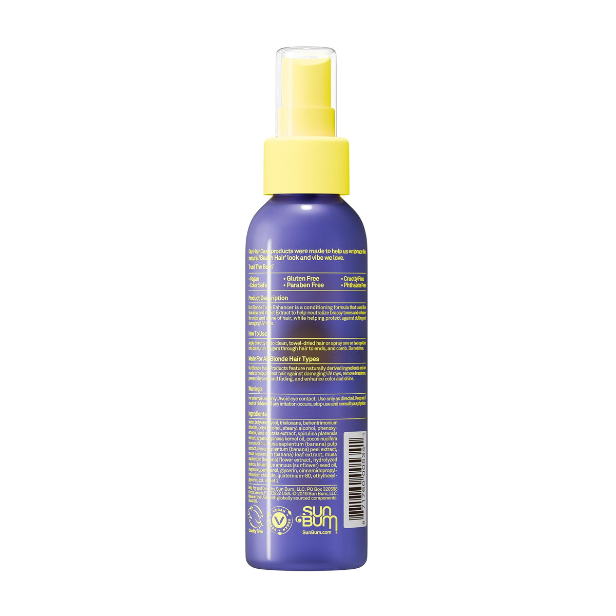 Sun Bum bottle on sandy beach, UV protection and color care outdoors