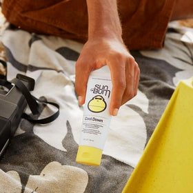 Sun Bum Cool Down applied to palm demonstrating soothing, cooling relief after sun exposure